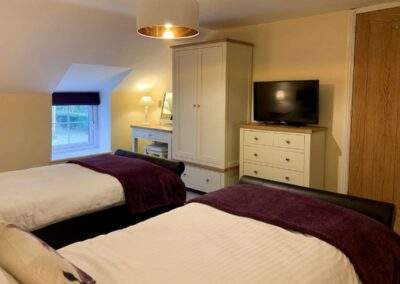 Rosemary Cottage Twin Bedroom With TV